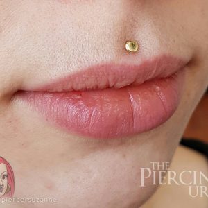 above-lip-piercing